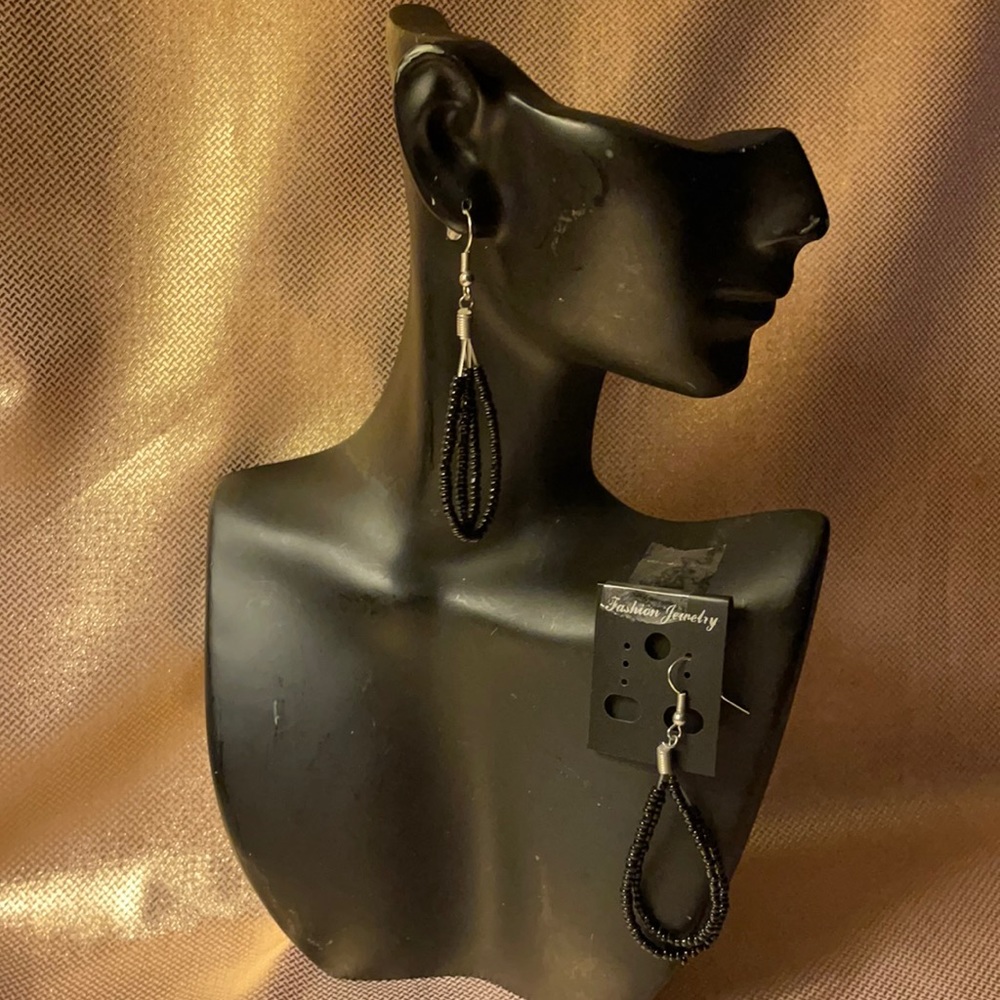 Black beaded tear drop dangle hoop earrings with silver colored fish hooks